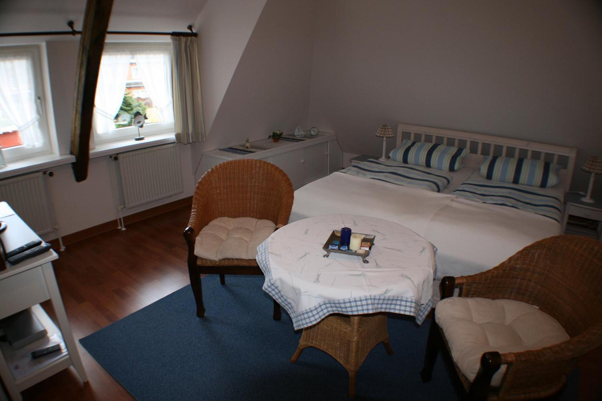 Ferienwohnungen Im Hotel Garni Zur Post Utersum Oda fotoğraf
