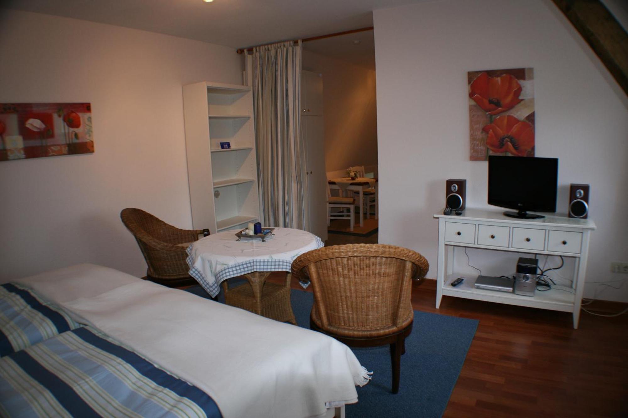 Ferienwohnungen Im Hotel Garni Zur Post Utersum Oda fotoğraf